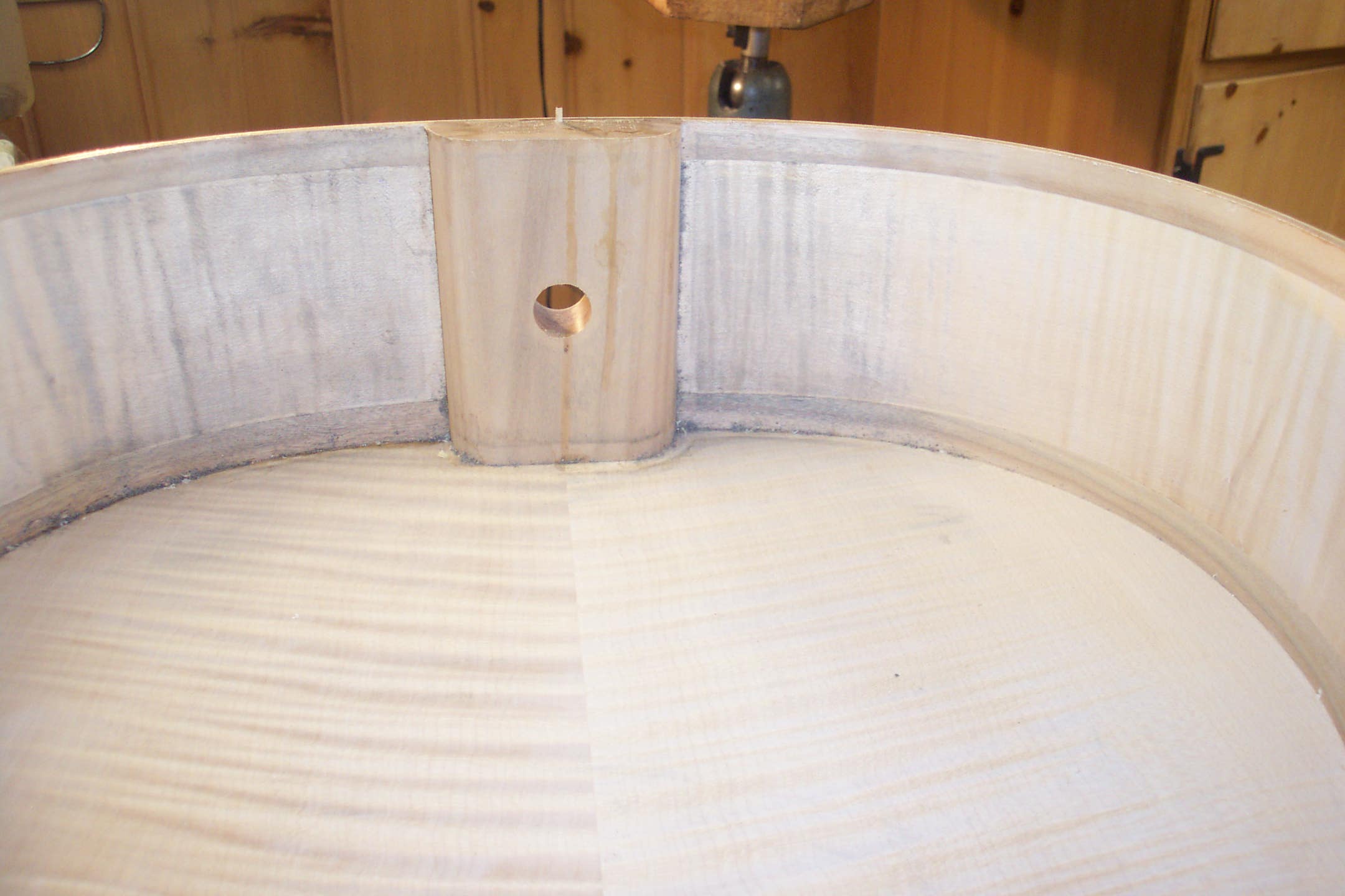 This is a picture of the inside of a cello where a snake type humidifier was used, showing discoloration from dripping water. This is not uncommon.